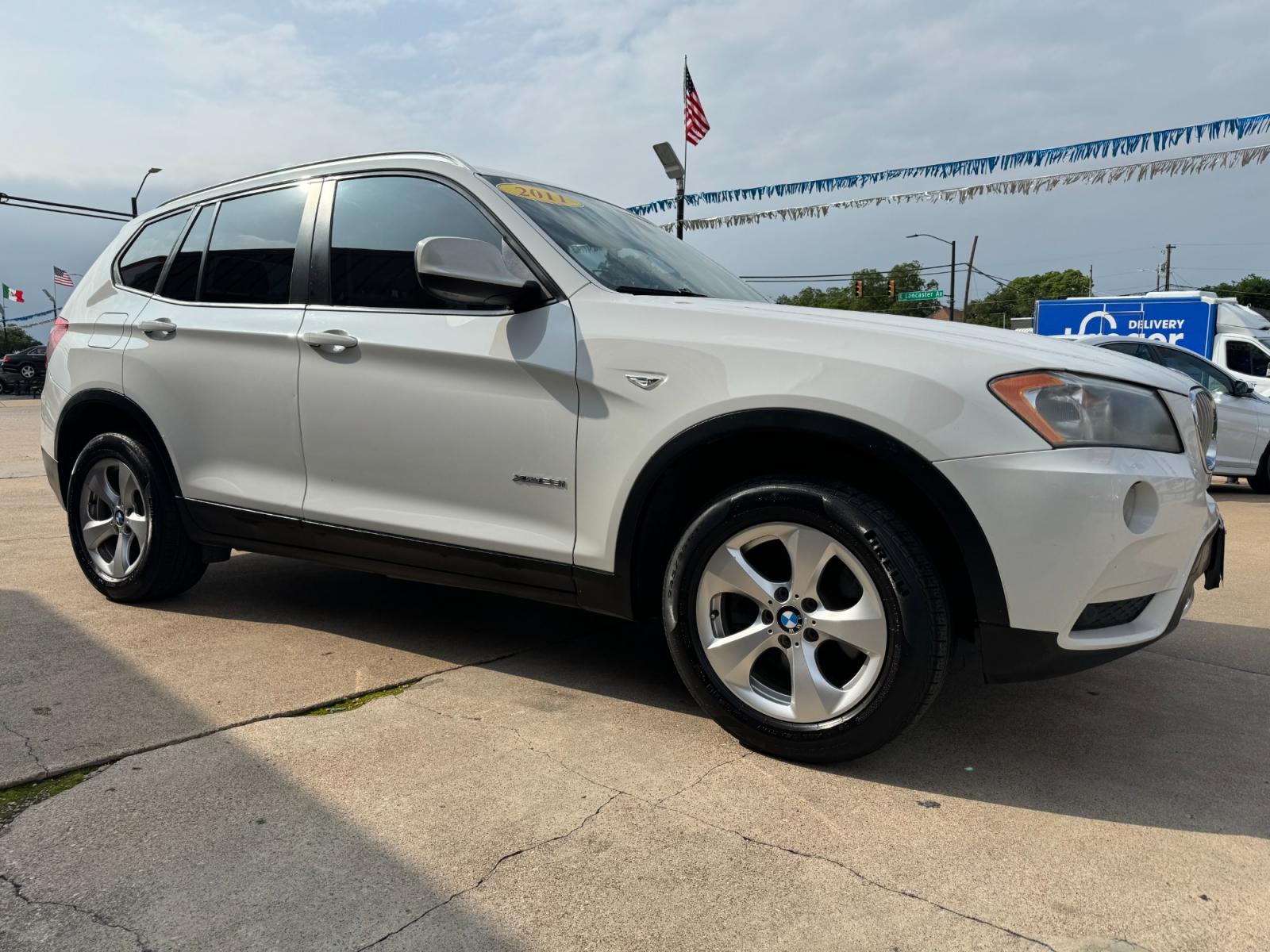 2011 WHITE BMW X3 (5UXWX5C59BL) , located at 5900 E. Lancaster Ave., Fort Worth, TX, 76112, (817) 457-5456, 0.000000, 0.000000 - This is a 2011 BMW X3 XDRIVE 28I LUXURY 4 DR WAGON that is in excellent condition. The interior is clean with no rips or tears or stains. All power windows, door locks and seats. Ice cold AC for those hot Texas summer days. It is equipped with a CD player, AM/FM radio. It runs and drives like new. T - Photo #2
